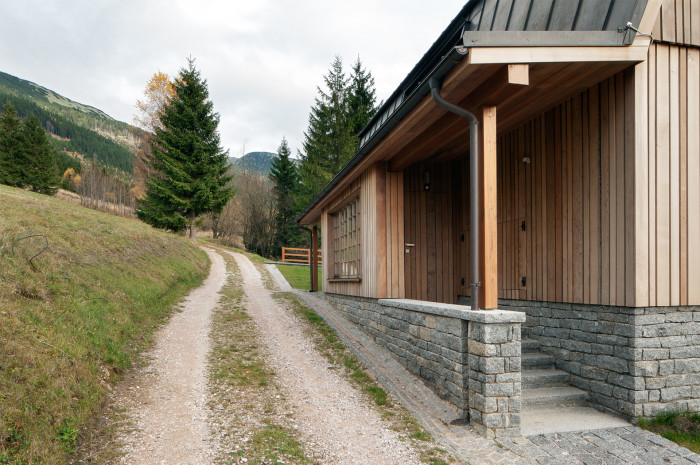 Přestavba chaty ve Svatém Petru, Znamení čtyř - architekti