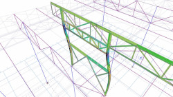Napjatost kombinovaného rámovo-příhradového příčného ztužidla při zatížení větrem (deformovaný tvar)