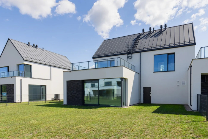 Okenní a dveřní systém s tepelnou izolací MB-86N - Aluprof v NeoNatolin ve Varšavě.