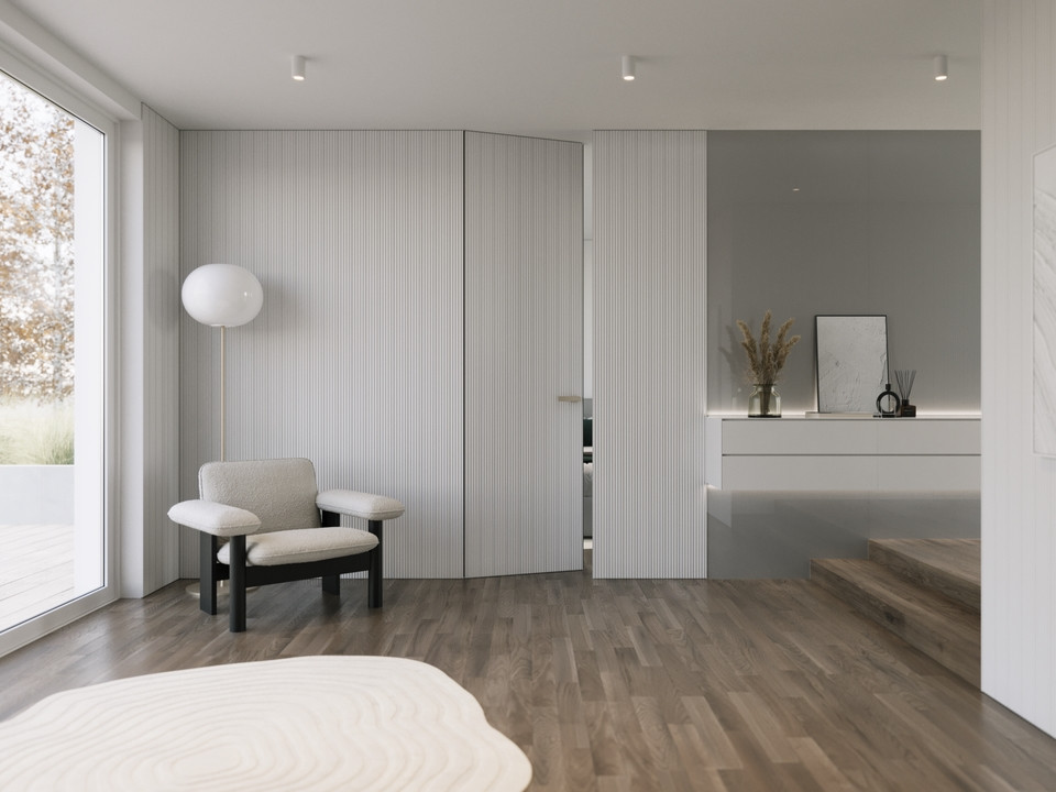 Atypické provedení dveří se skrytými zárubněmi a sjednoceným obkladem dveří a stěny