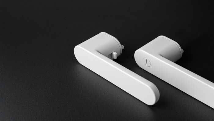 MPK Impressa Switch Lock - interiérová klika s integrovaným uzamykáním