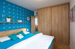 Mooza architecture, Byt na modré vlně – foto