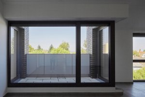 Studio T2.a Architects proměnilo cihlovou budovu mlýnů na okraji Budapešti na moderní loftové byty