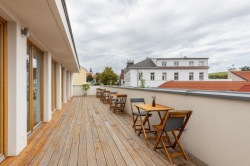 Podnikatelský inkubátor Dům na rohu ve Valašských Kloboukách od studia Jan Hanousek Architekti