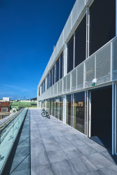 Hliníkové profily, sklo, barevnost, vše muselo v rozumné míře vyhovět zachování architektonického záměru původních architektů.