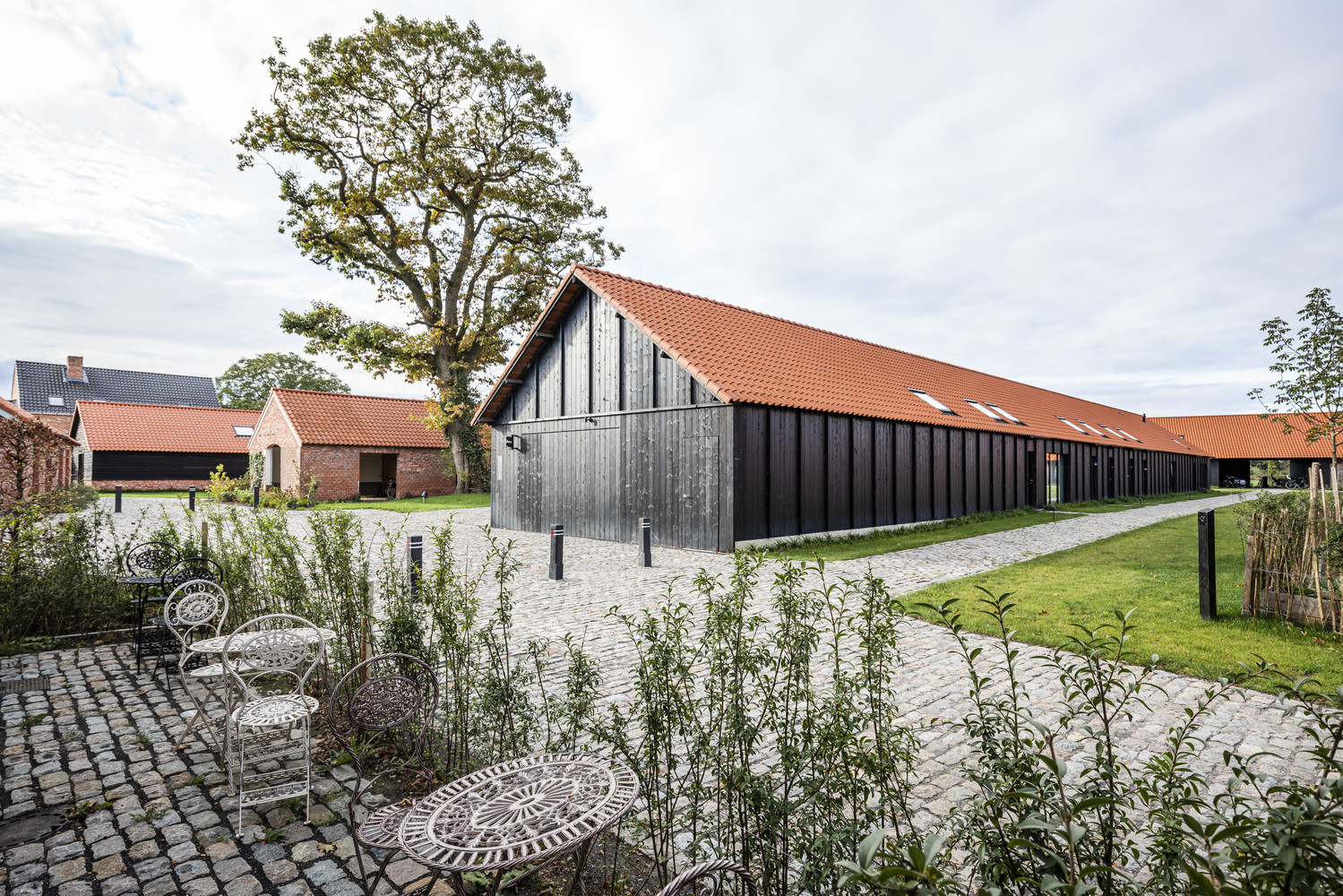 Projekt komunitního bydlení Q-ville v Belgii