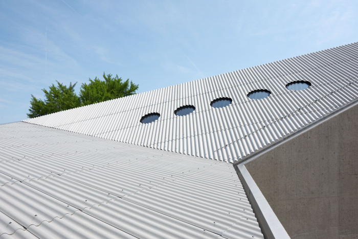 Vlnitá střešní krytina Swisspearl na Státním muzeum v Curychu