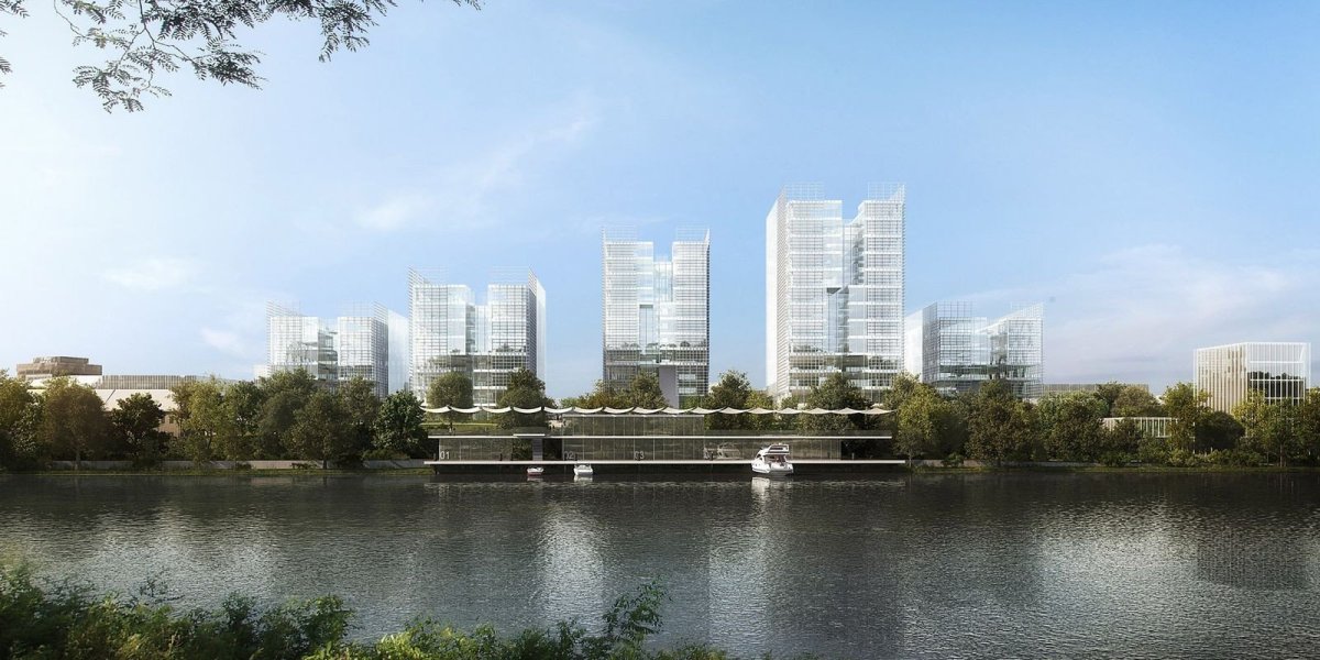Ideová urbanistická studie Wolf-Prefa, EA-architekti, 2014-15. Pohled z druhého břehu zobrazující solitérní budovy v příjemné gradaci k Vltavě. Vpravo je patrný objekt SAC ve zcela novém pojetí.