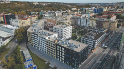 Obytný soubor v indtustriální zahradě. Rezidence Pergamenka v Praze, A69 architekti