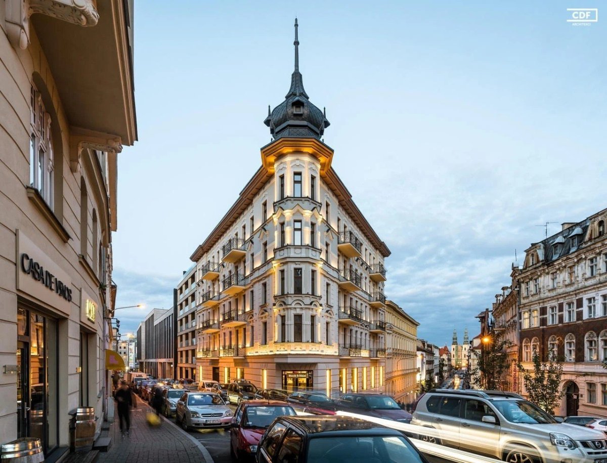 Sloupko-příčková, strukturální fasáda MB-SR50N EFEKT v Żelazko - Residential and commercial building v Poznańi v Polsku.