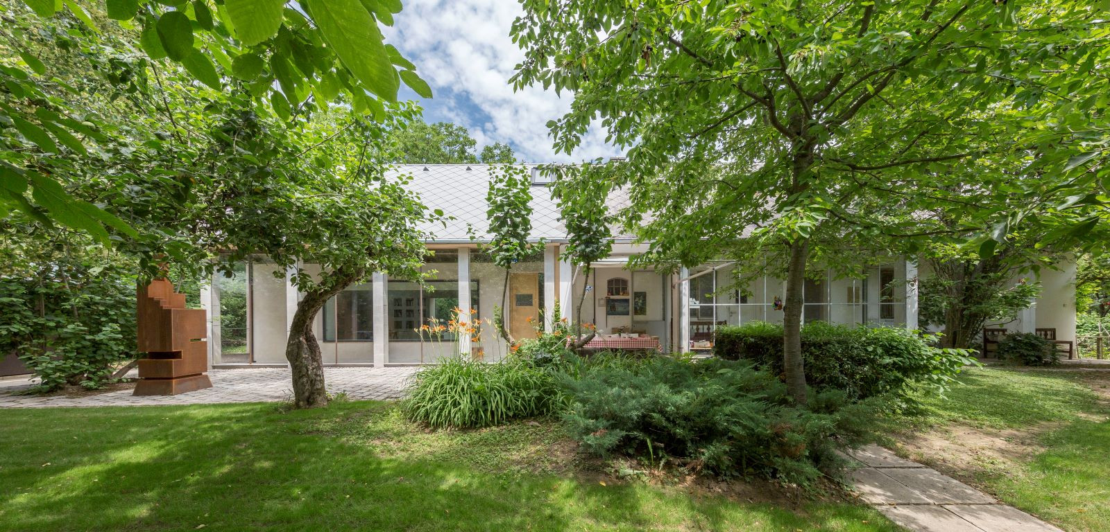 Přístavba domu v areálu bývalé cihleny v Čachticích, Architekti A B.K.P.Š.