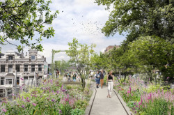 Vizualizace Bergweg. Z bývalé stanice, nově komunitní zahrady Luchtpark, dále pokračuje viadukt, který se klikatí hustě osídleným centrem. Z této železniční dráhy vznikne v nadcházejících letech nový park Hofbogenpark. 