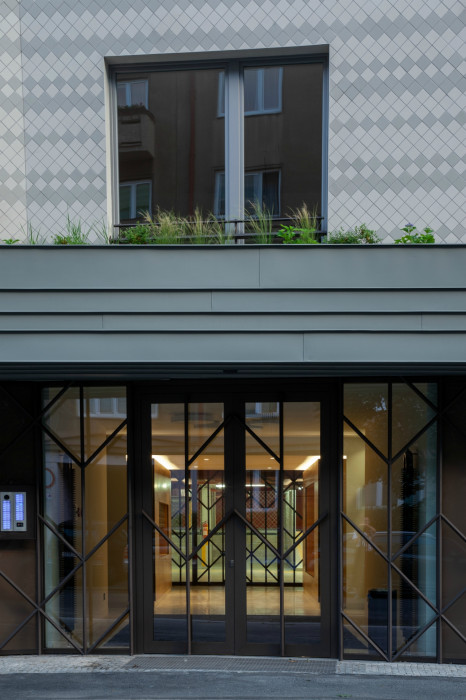 Bytový dům Sámova, Znamení čtyř - architekti