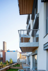 Bytový dům Sámova, Znamení čtyř - architekti