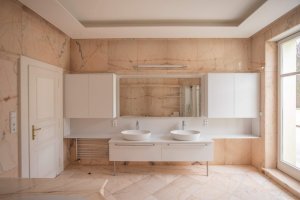 Rekonstrukce koupelny v pražském rodinném domě od designérského studia Revír