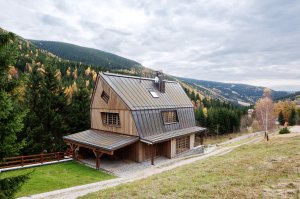 Přestavba chaty ve Svatém Petru, Znamení čtyř - architekti
