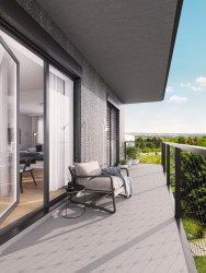 SCHINDLER SEKO ARCHITEKTI navrhli prefabrikovaný bytový dům polyfunkčního charakteru Happi Milánská v Horních Měcholupech