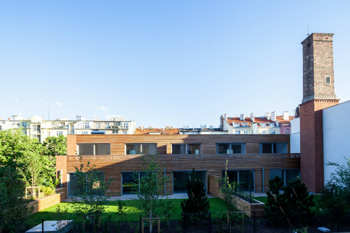 Bytový dům Sámova, Znamení čtyř - architekti