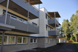 Uplatnění fasádních desek Cembrit Raw na balkónových konstrukcích - foto