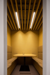 Interiér osmého podlaží Drnu od Studio acht a Vos Interieur