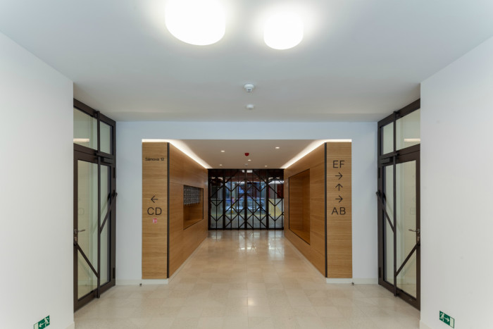 Bytový dům Sámova, Znamení čtyř - architekti