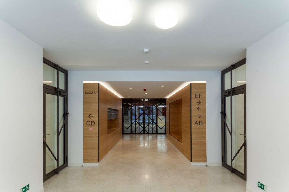 Bytový dům Sámova, Znamení čtyř - architekti