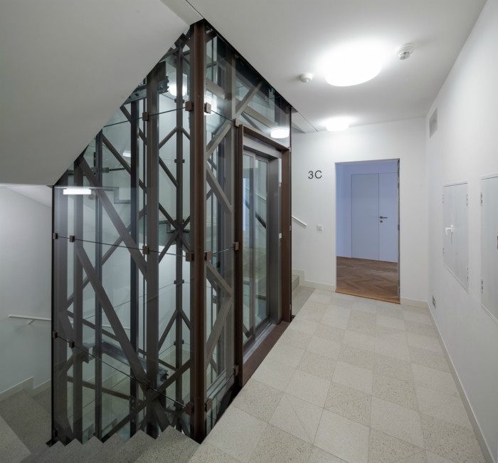 Bytový dům Sámova, Znamení čtyř - architekti