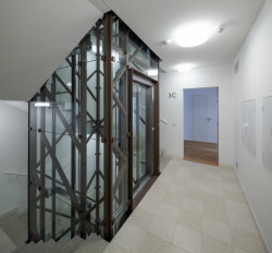 Bytový dům Sámova, Znamení čtyř - architekti