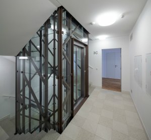 Bytový dům Sámova, Znamení čtyř - architekti