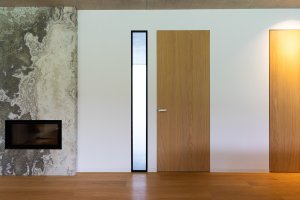 Dveře se skrytými zárubněmi představují dnes jeden z klíčových prvků moderního interiérového designu.