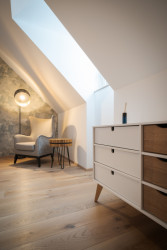 Stavení s červenou pumpou od DESTYL architekti