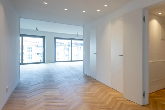 Bytový dům Sámova, Znamení čtyř - architekti