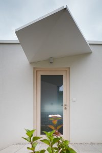 Rodinný dům ve svahu, masparti