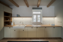 Stavení s červenou pumpou od DESTYL architekti