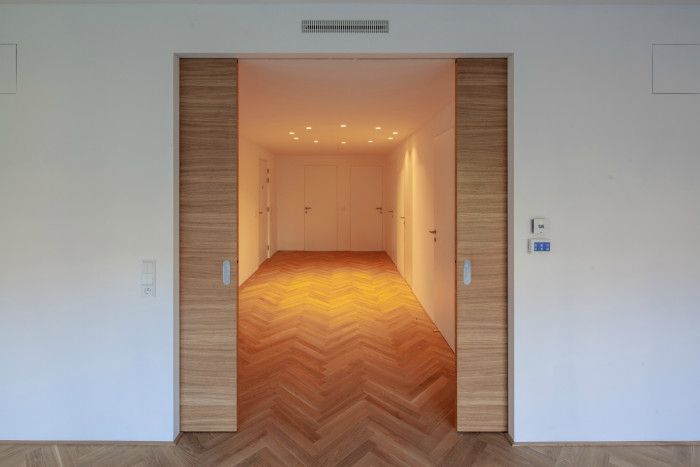 Bytový dům Sámova, Znamení čtyř - architekti