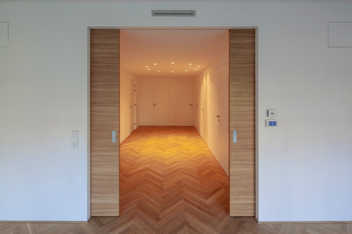Bytový dům Sámova, Znamení čtyř - architekti