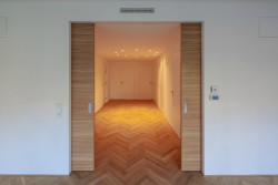 Bytový dům Sámova, Znamení čtyř - architekti