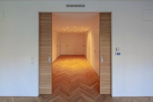 Bytový dům Sámova, Znamení čtyř - architekti