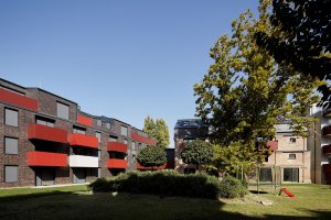 Studio T2.a Architects proměnilo cihlovou budovu mlýnů na okraji Budapešti na moderní loftové byty