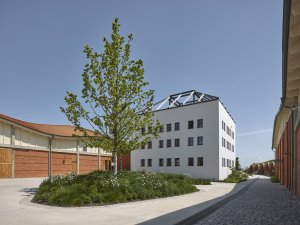 Jakub Cigler Architekti proměnili bývalý areál JZD na zážitkové vinařství s ubytováním