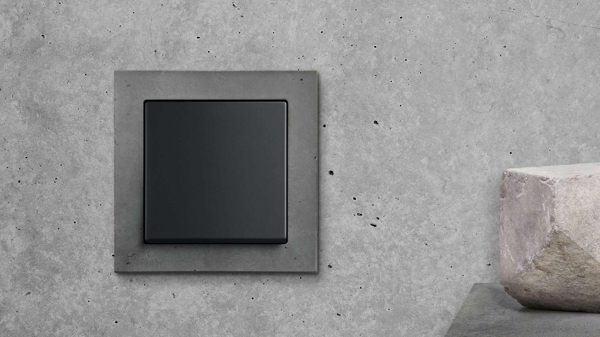 Stěnám z pohledového betonu sluší betonový rámeček; Busch-Axcent®