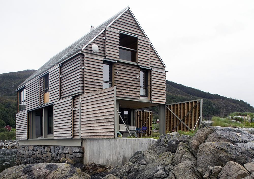 Knut Hjeltnes AS Sivilarkitekter MNAL, chata na osrůvku Sildegarnsholmen, se všemi dveřmi otevřenými, foto