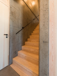 Červený dům z betonu v Lillehammeru, Sanden + Hodnekvam Architects/ John Sanden, Ingvild Hodnekvam, Anders Bjørneseth.