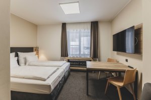Studio Gebas realizovalo v Peci pod Sněžkou Hotel Zelený potok zahalený do dřeva.