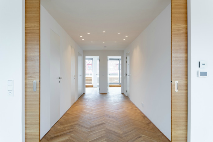 Bytový dům Sámova, Znamení čtyř - architekti