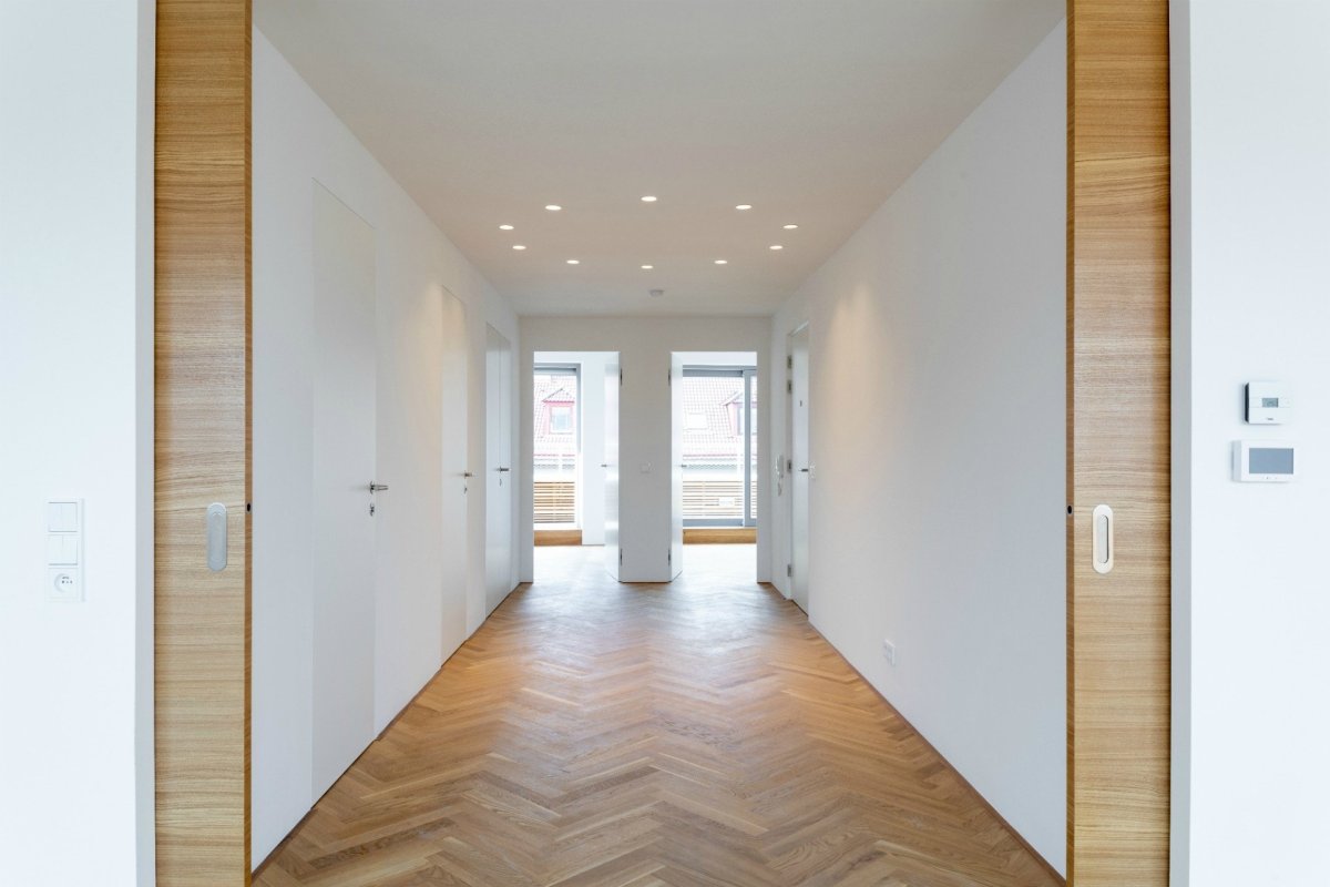 Bytový dům Sámova, Znamení čtyř - architekti