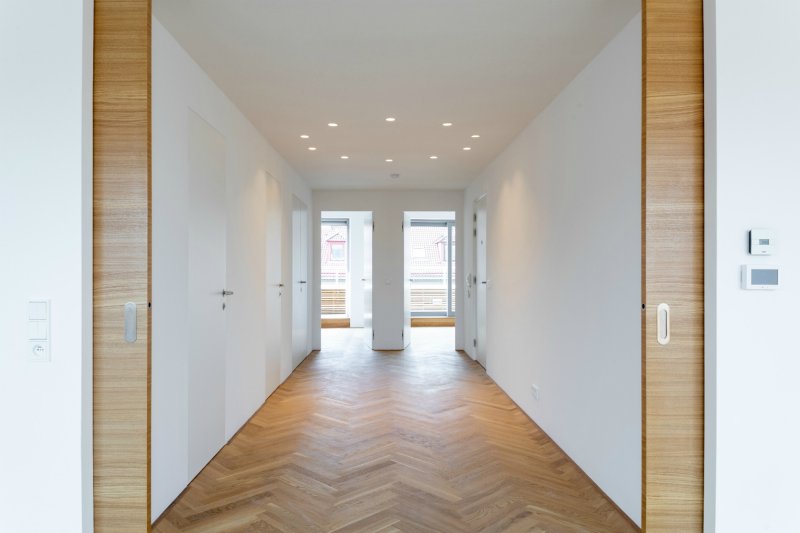 Bytový dům Sámova, Znamení čtyř - architekti