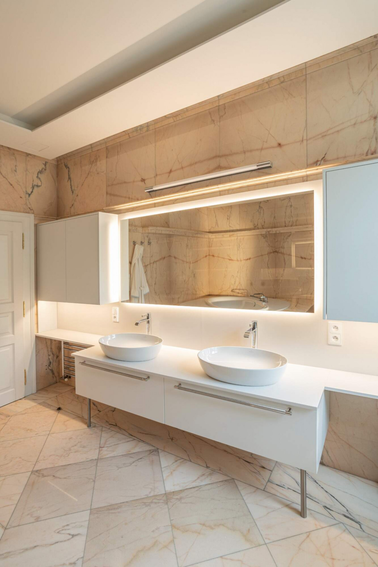 Rekonstrukce koupelny v pražském rodinném domě od designérského studia Revír