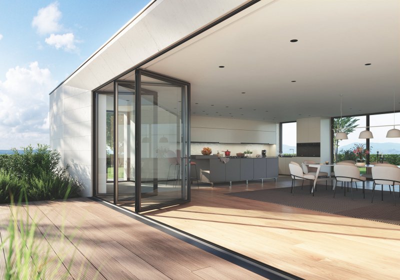 Nové hliníkové shrnovací systémy Schüco AS FD 75/90.HI se štíhlými hliníkovými rámy zázračně šetří prostor: Snadno se shrnou stranou do úzkých plochých svazků.