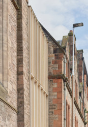 Greyfriars Charteris Center v Edinburghu od studia Konishi Gaffney Architects
